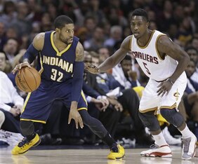 Indiana Pacers guard C.J. Watson tries to get past the defense of Cleveland Cavaliers guard Will Cherry on Nov. 29.