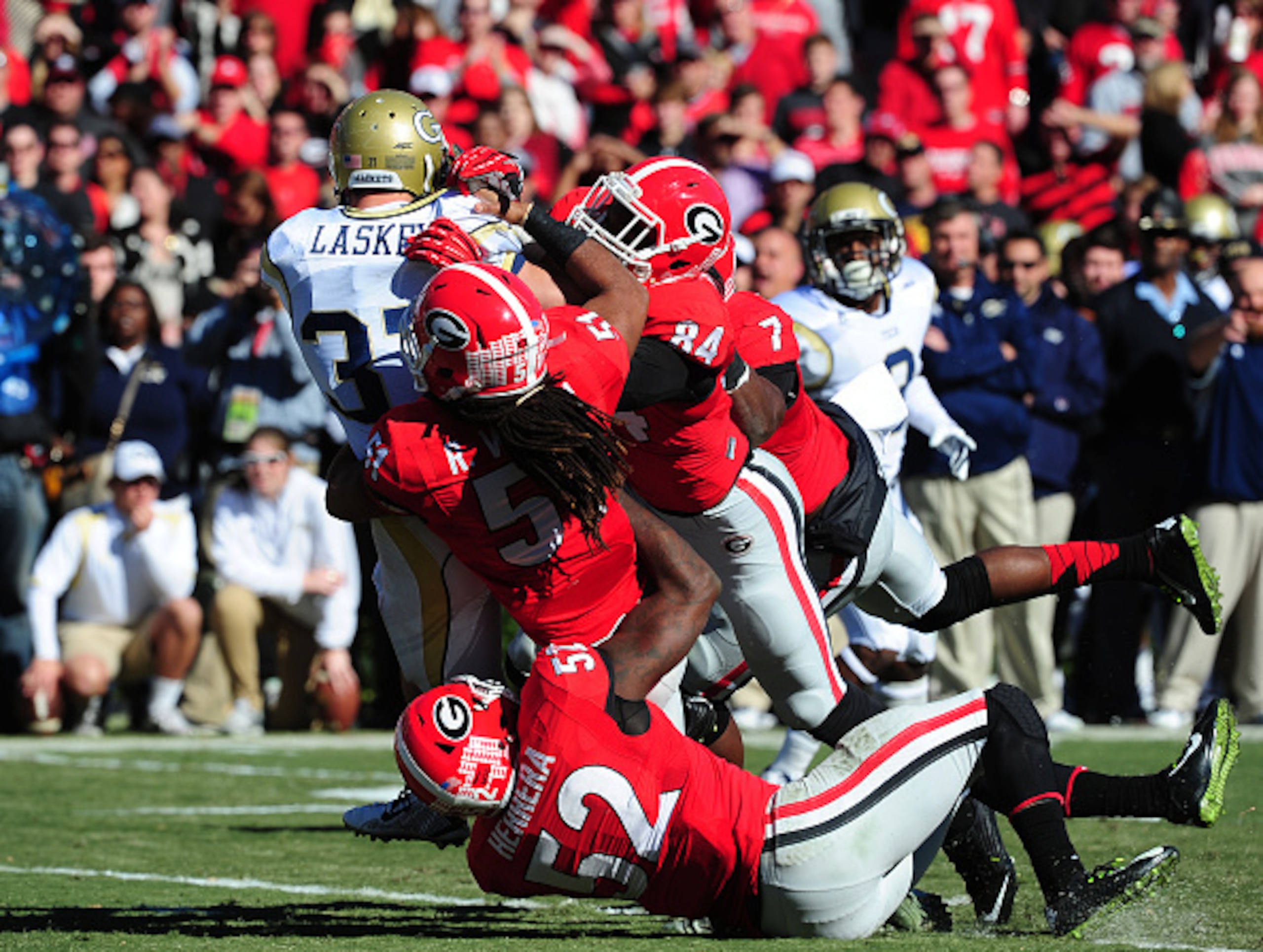 The Georgia defense swarms.