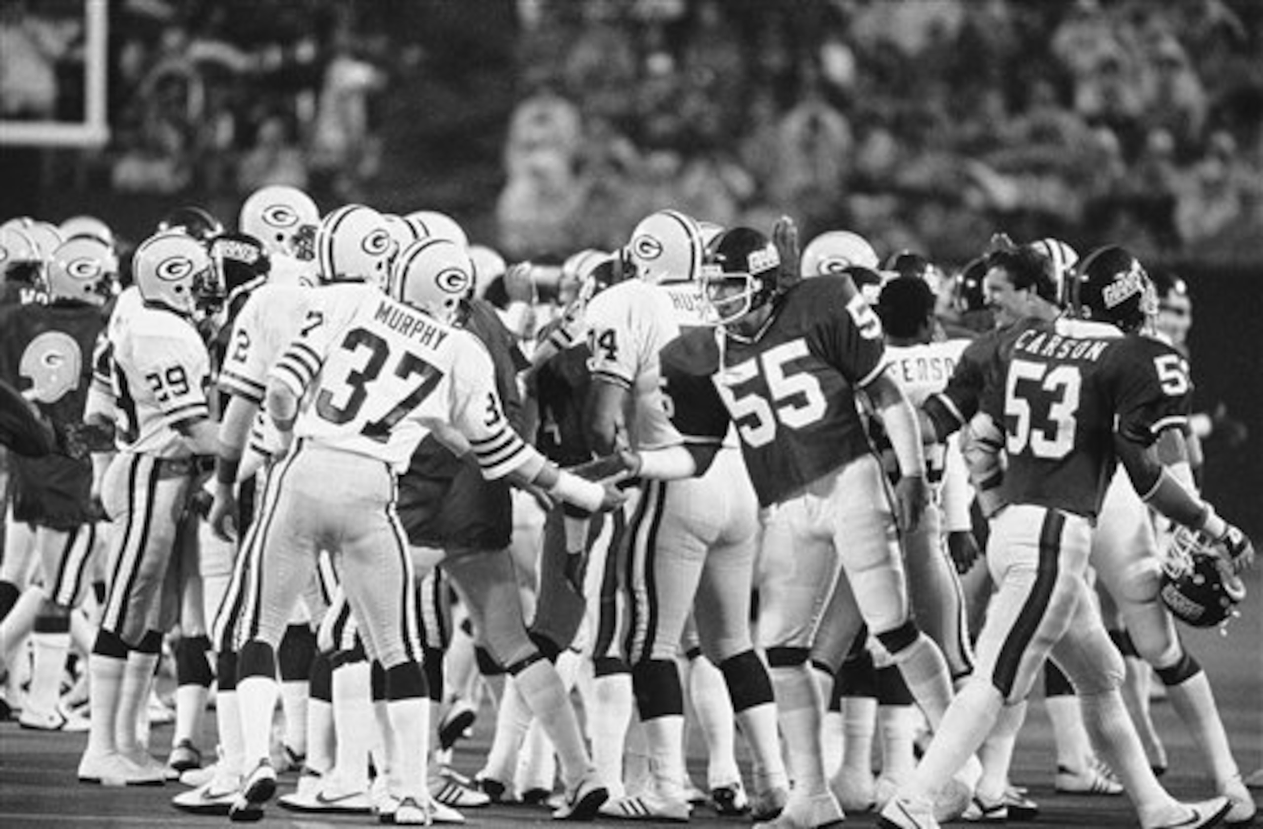 The Packers and Giants shook hands before the game for union solidarity.