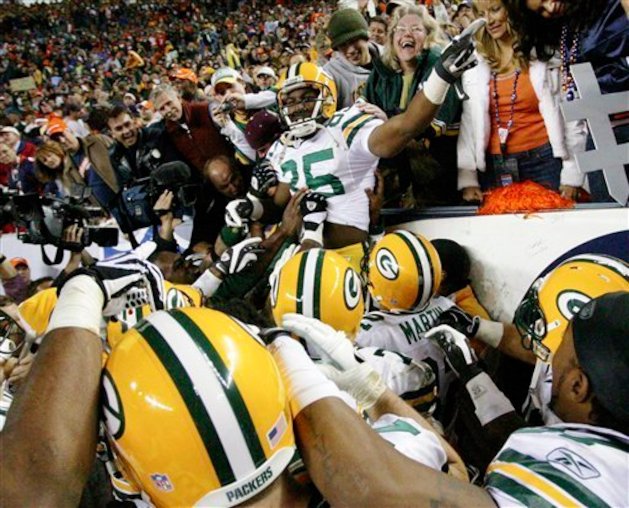 Greg Jennings jumped into the stands after scoring the winning TD.