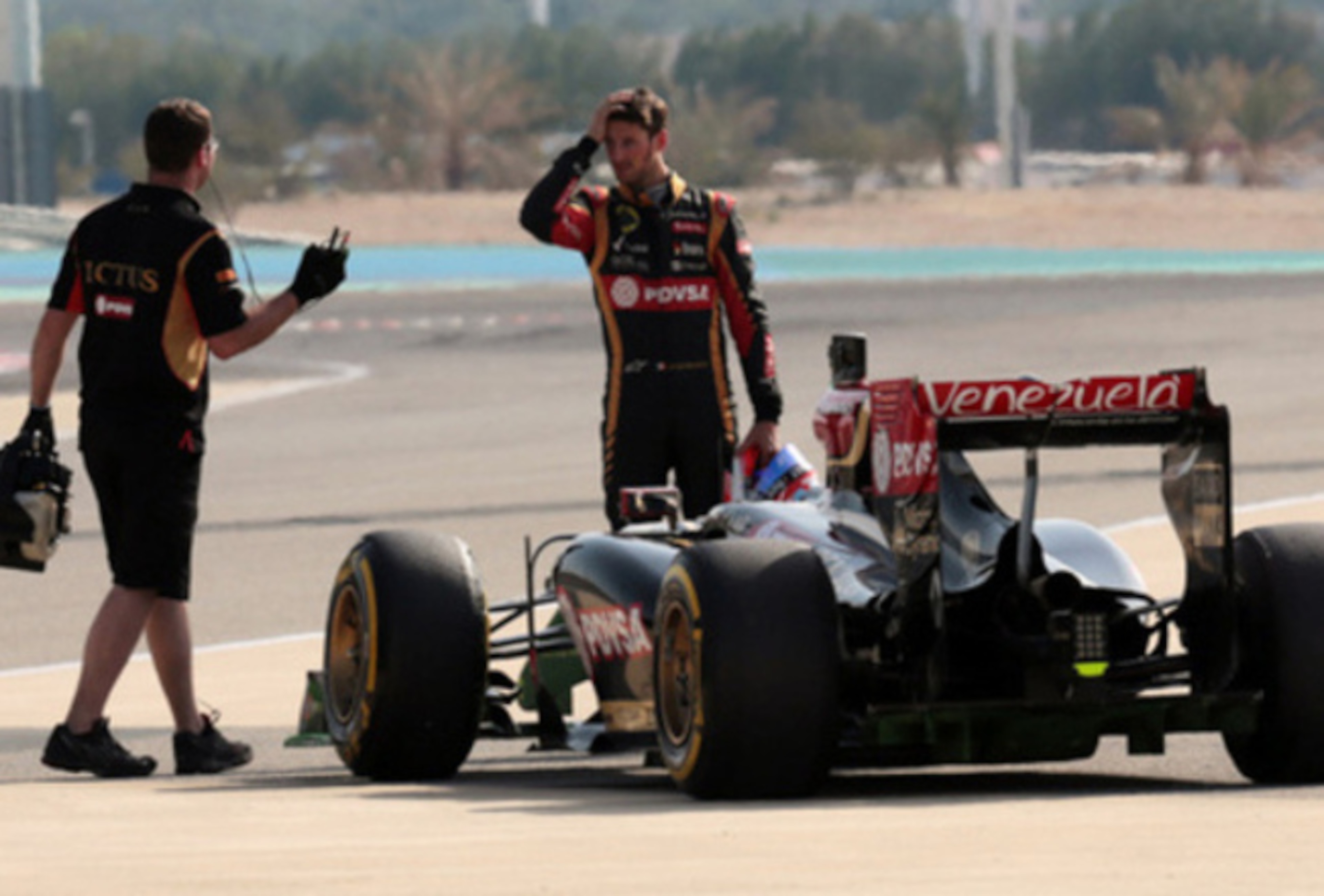 A sign of things to come: Grosjean's car breaks down during preseason testing in Bahrain.