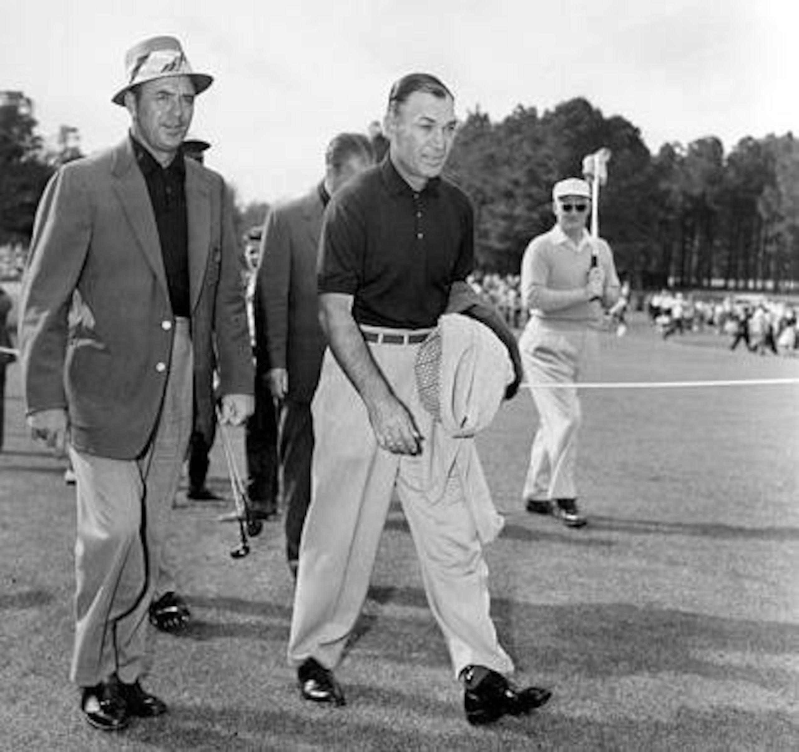 Sam Snead, Ben Hogan walk the fairways at Augusta National Club.