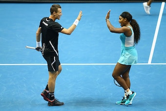 Tomas Berdych and Serena Williams celebrate mixed doubles win in Singapore.