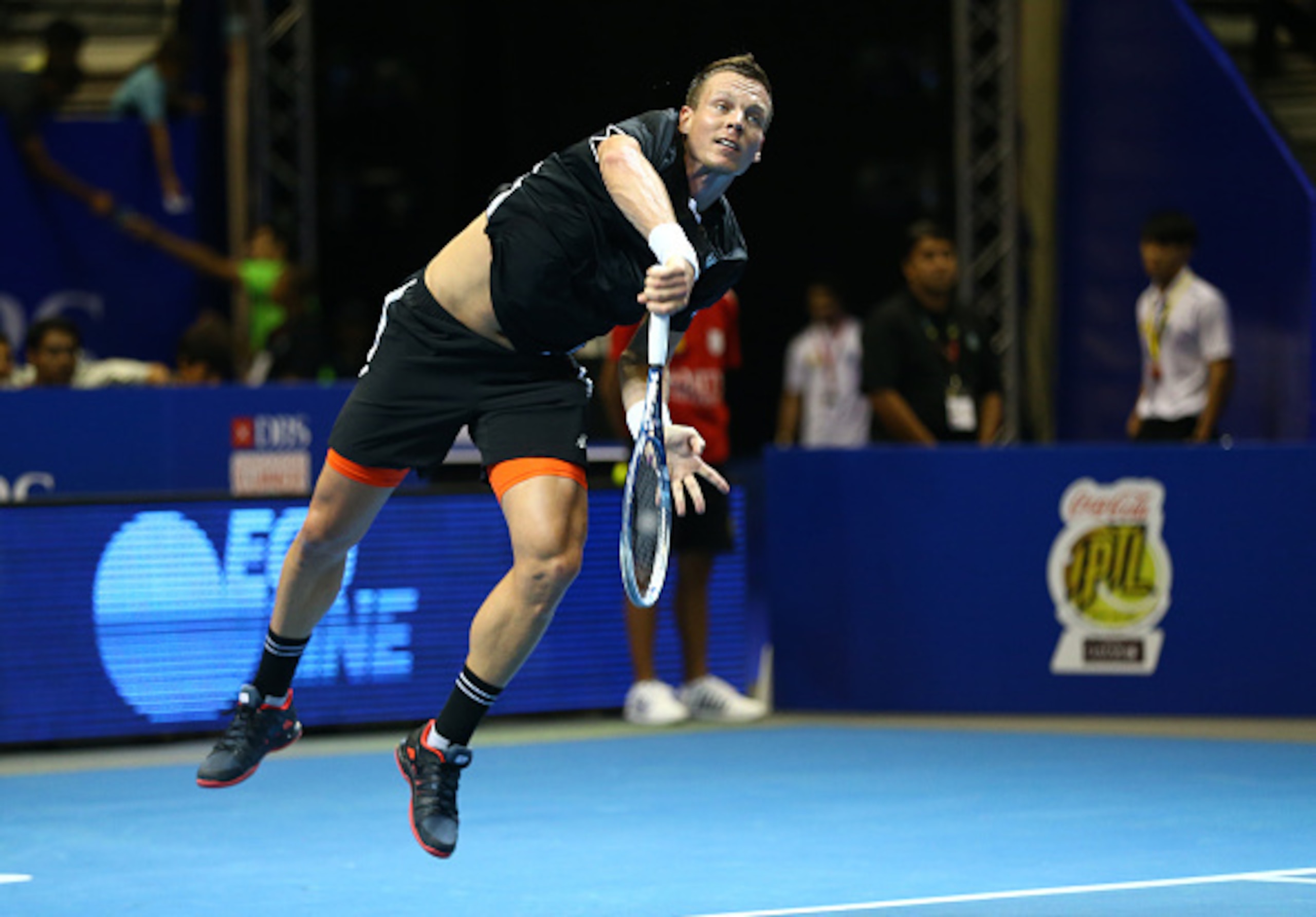 Tomas Berdych serves during a IPTL match.