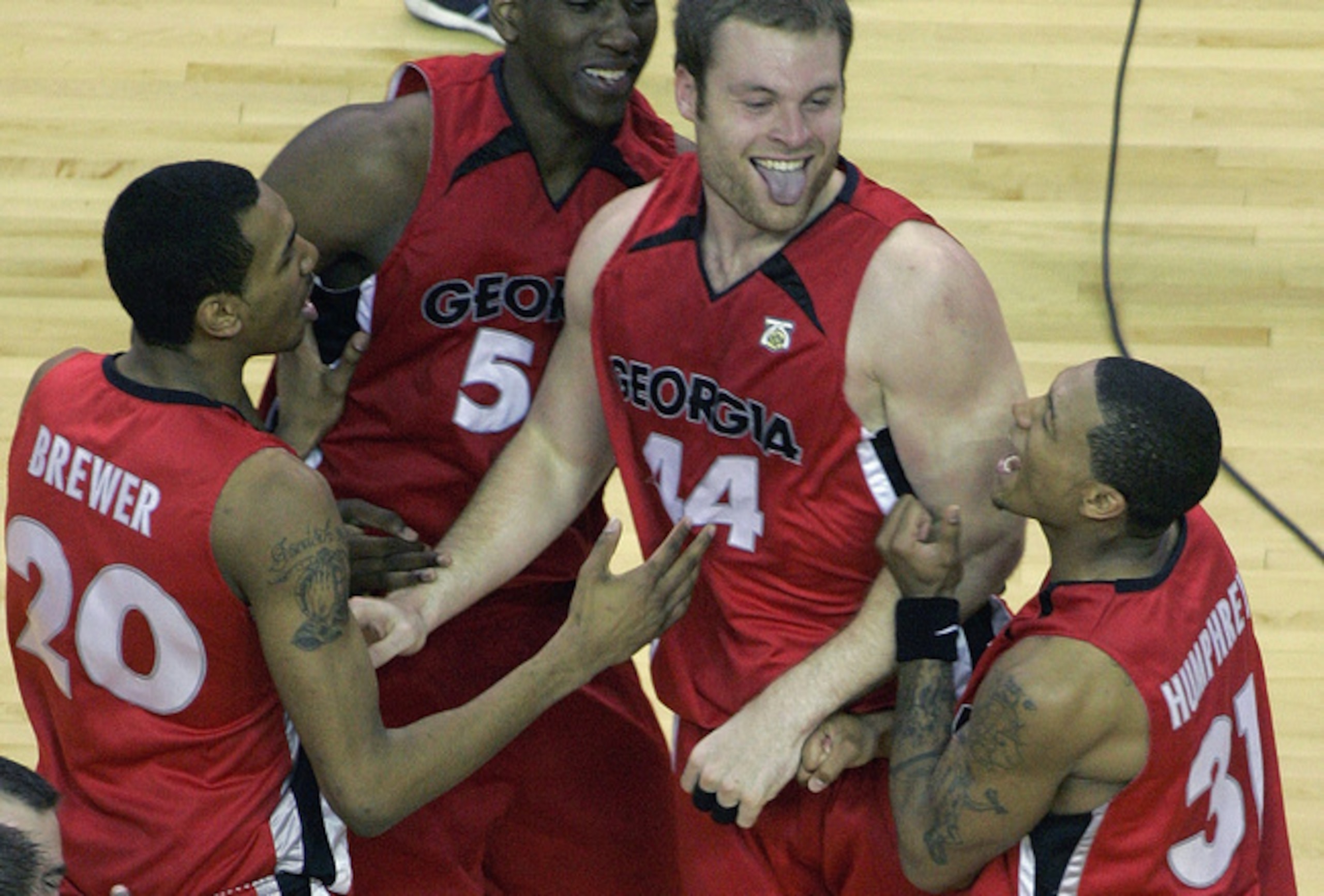 Dave Bliss celebrates with his Bulldog teammates during the 2008 SEC Tournament.