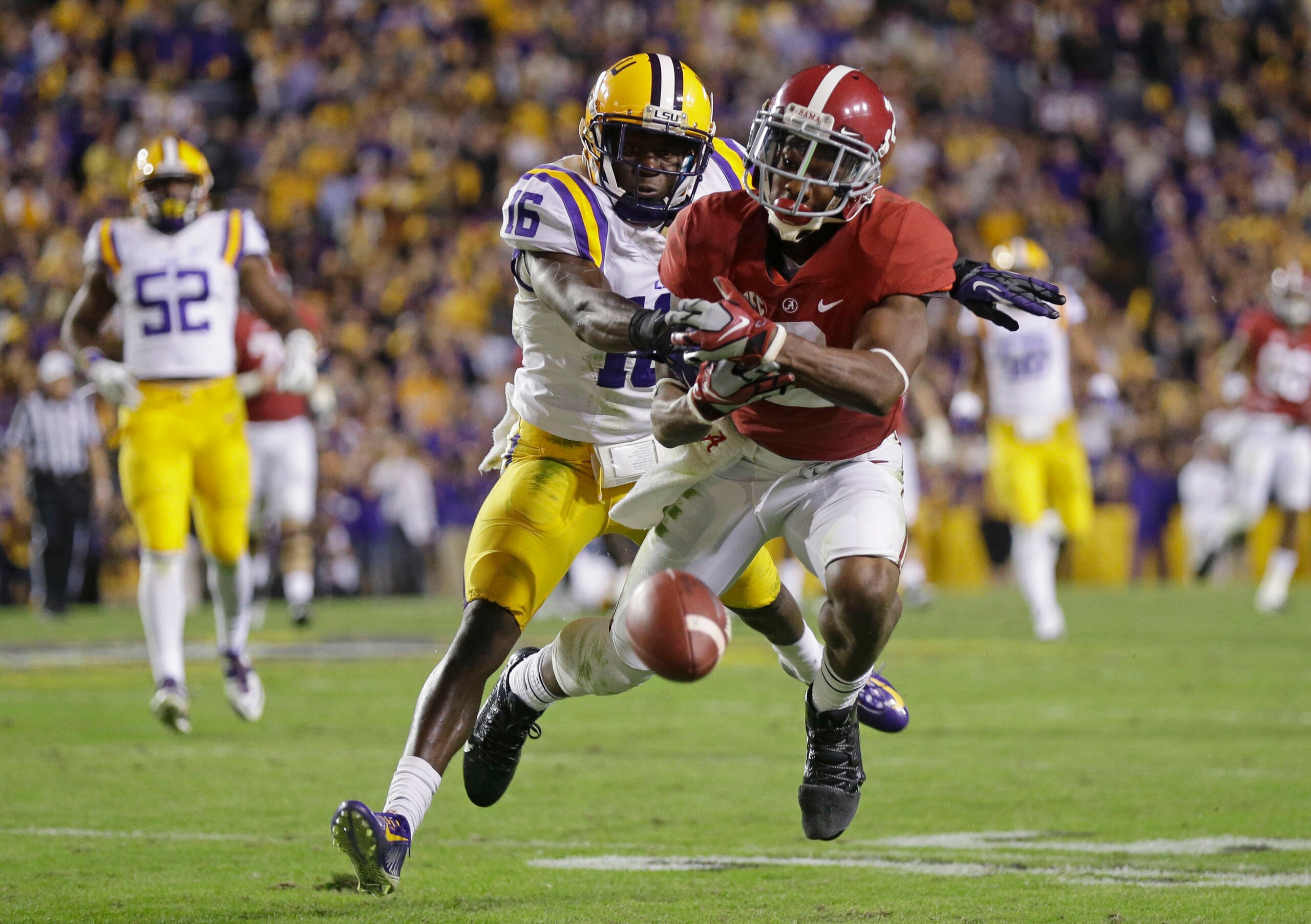 LSU cornerback Tre'Davious White (No. 16) breaks up a pass against Alabama's DeAndrew White.