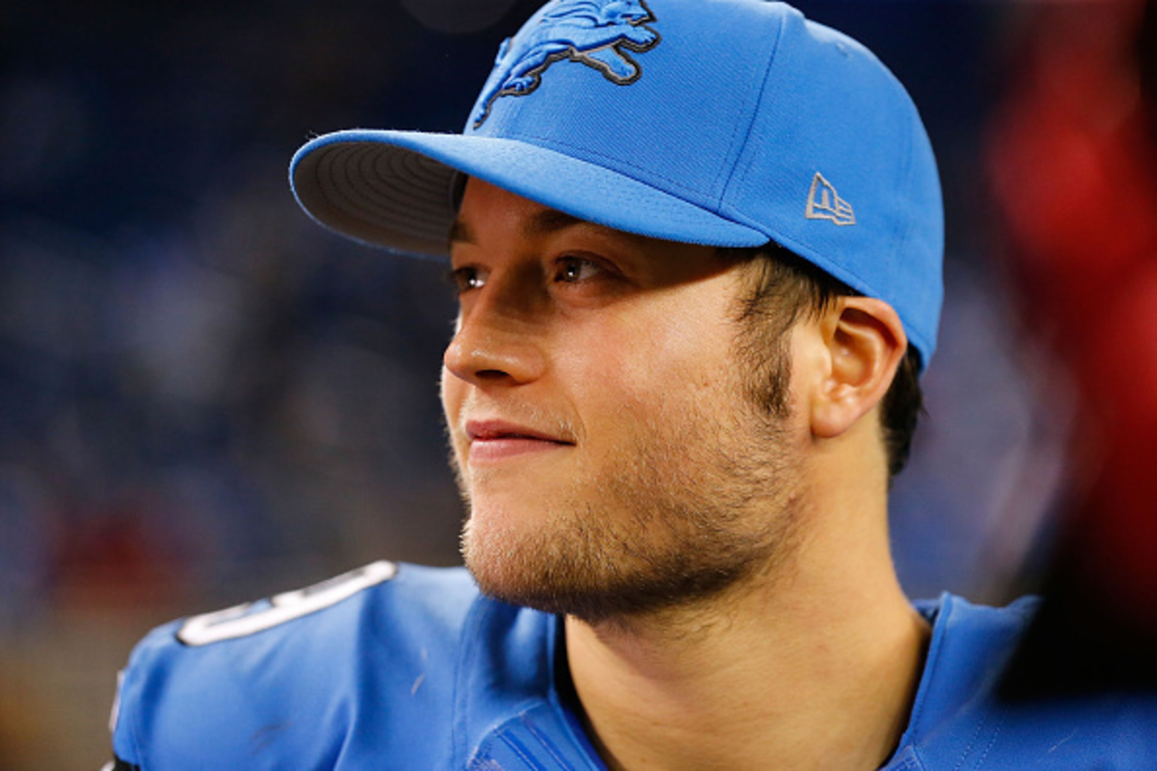 DETROIT, MI - NOVEMBER 27:  Matthew Stafford #9 of the Detroit Lions talks with the sideline reporters after the game against the Chicago Bears at Ford Field on November 27, 2014 in Detroit, Michigan. The Lions defeated the Bears 34-17.  (Photo by Leon Ha