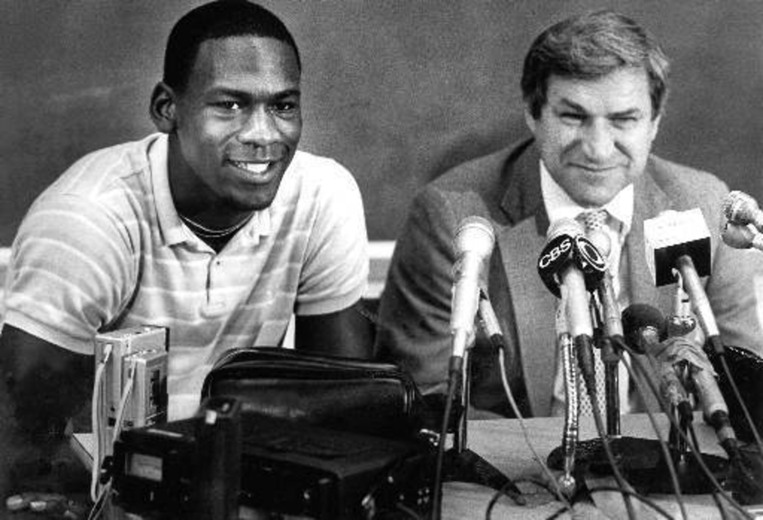 Michael Jordan (left) and coach Dean Smith Michael Jordan (left) and coach Dean Smith