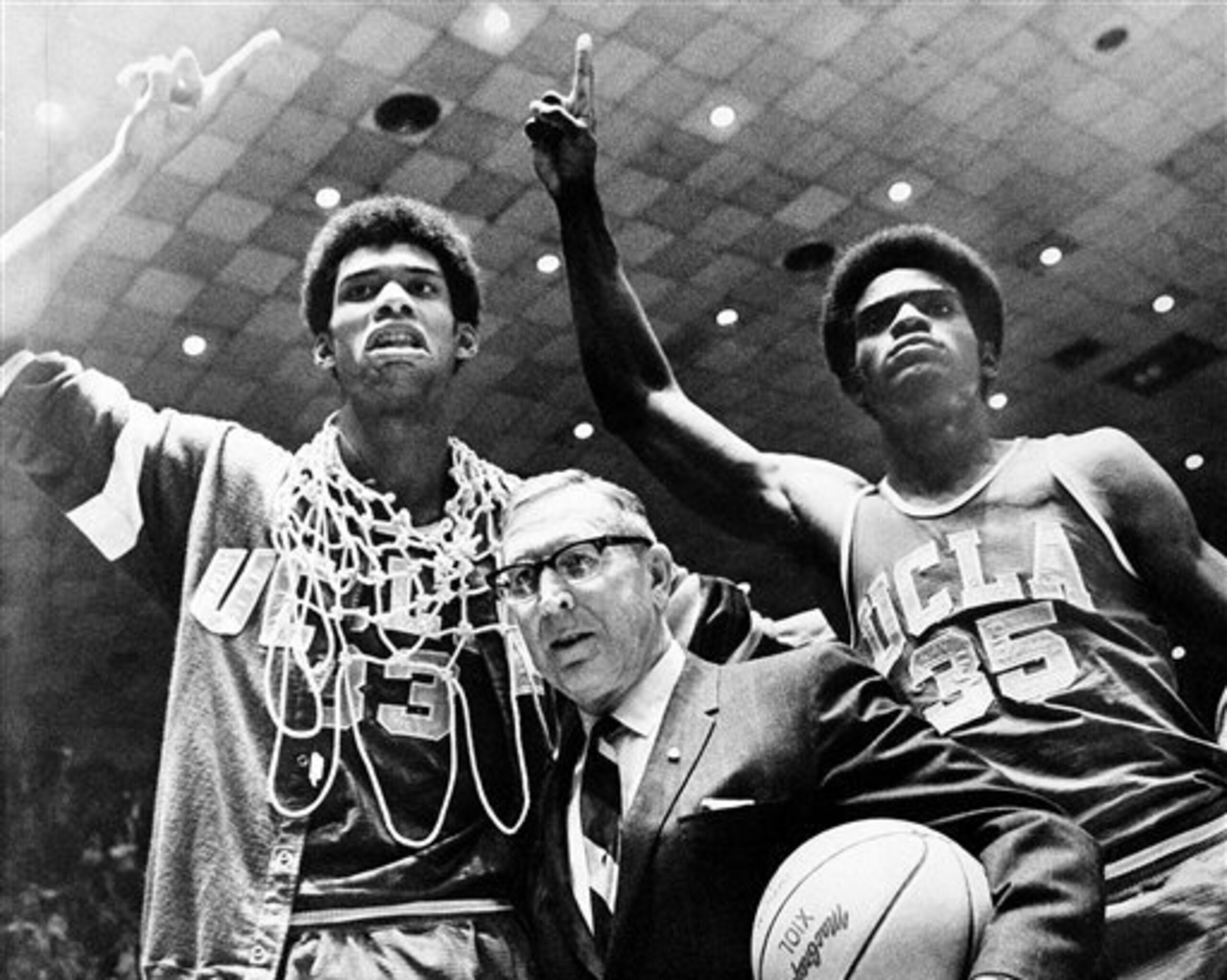 Lew Alcindor (left), coach John Wooden and Sidney Wicks Lew Alcindor (left), coach John Wooden and Sidney Wicks