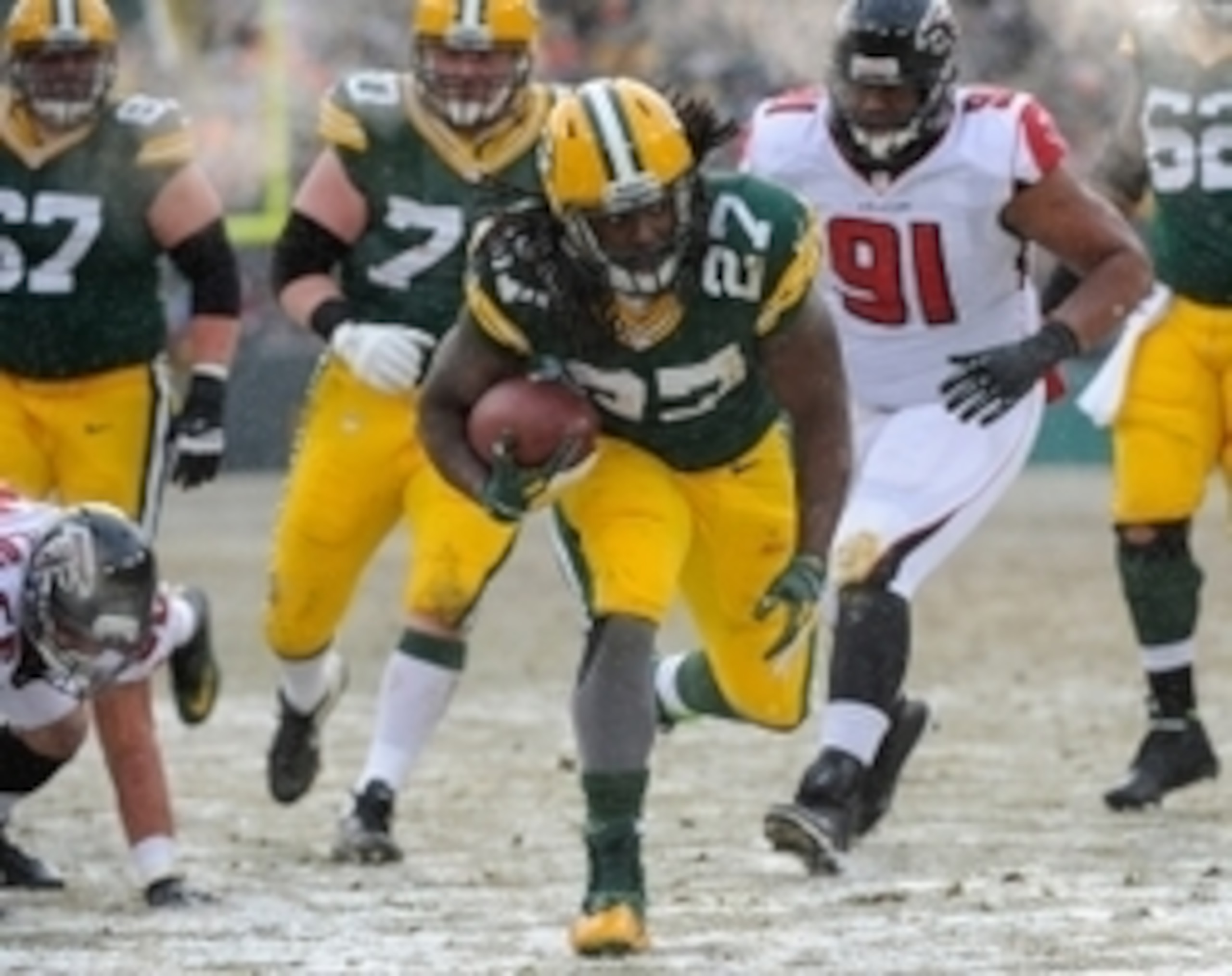 Eddie Lacy ran through the snow, and the Pack won a big game.