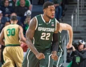 Dec 3, 2014; South Bend, IN, USA; Michigan State Spartans guard Branden Dawson (22) celebrates after a basket in the first half against the Notre Dame Fighting Irish at the Purcell Pavilion. Mandatory Credit: Matt Cashore-USA TODAY Sports