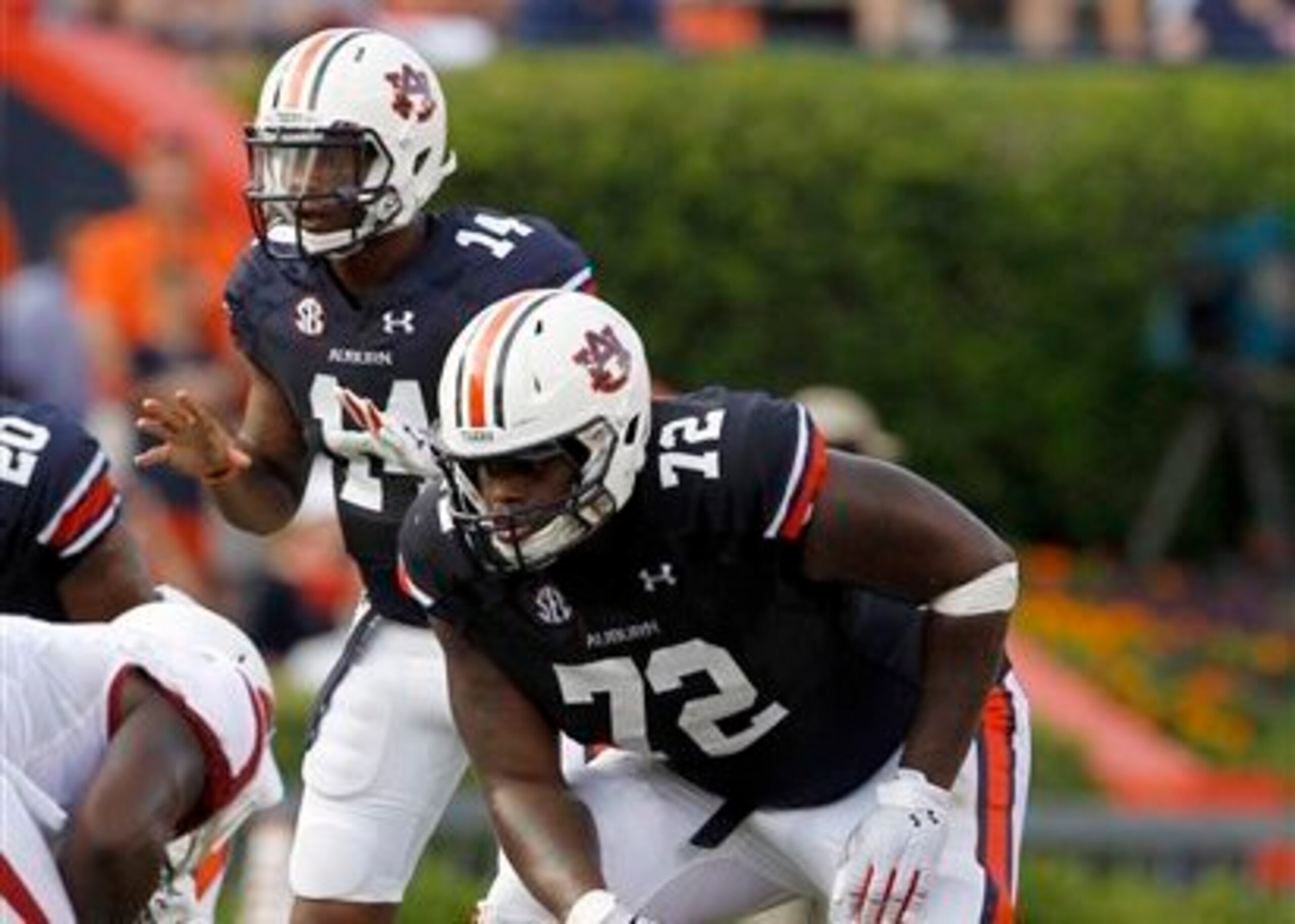 QB Nick Marshall and LT Shon Coleman QB Nick Marshall and LT Shon Coleman