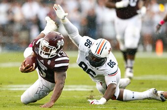 Mississippi State RB Josh Robinson and Auburn DE DaVonte Lambert