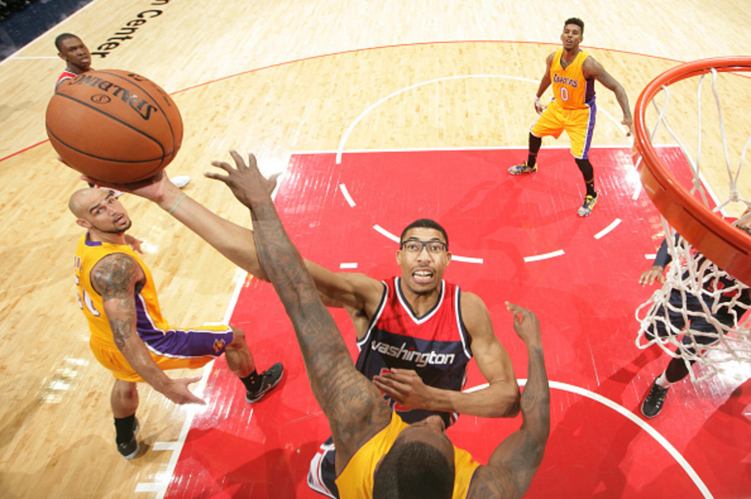 WASHINGTON, DC - DECEMBER 3: Otto Porter #22 of the Washington Wizards shoots against the Los Angeles Lakers during a game at the Verizon Center on December 3, 2014 in Washington, DC. NOTE TO USER: User expressly acknowledges and agrees that, by downloadi