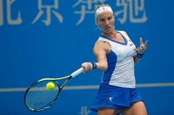 Svetlana Kuznetsova hits a forehand during the 2014 China Open.