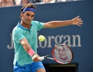 Roger Federer hits a backhand during a 2014 match.