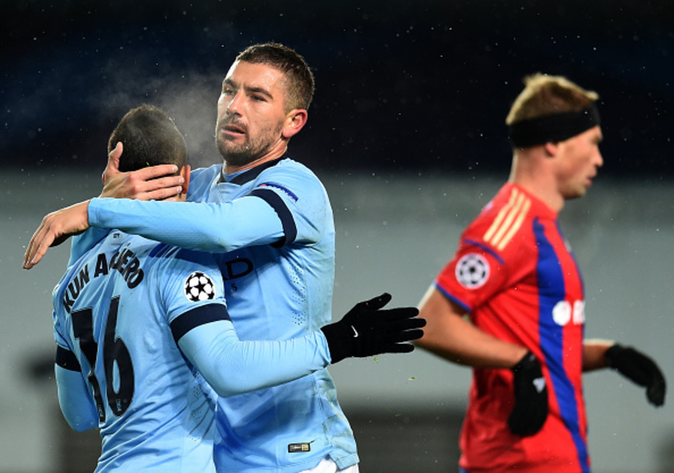 KHIMKI, RUSSIA - OCTOBER 21: Sergio Aguero (L) and Aleksandar Kolarov of Manchester City FC celebrate after scoring a goal during the UEFA Champions League Group E match between PFC CSKA Moscow and Manchester City FC at the Arena Khimki Stadium on October