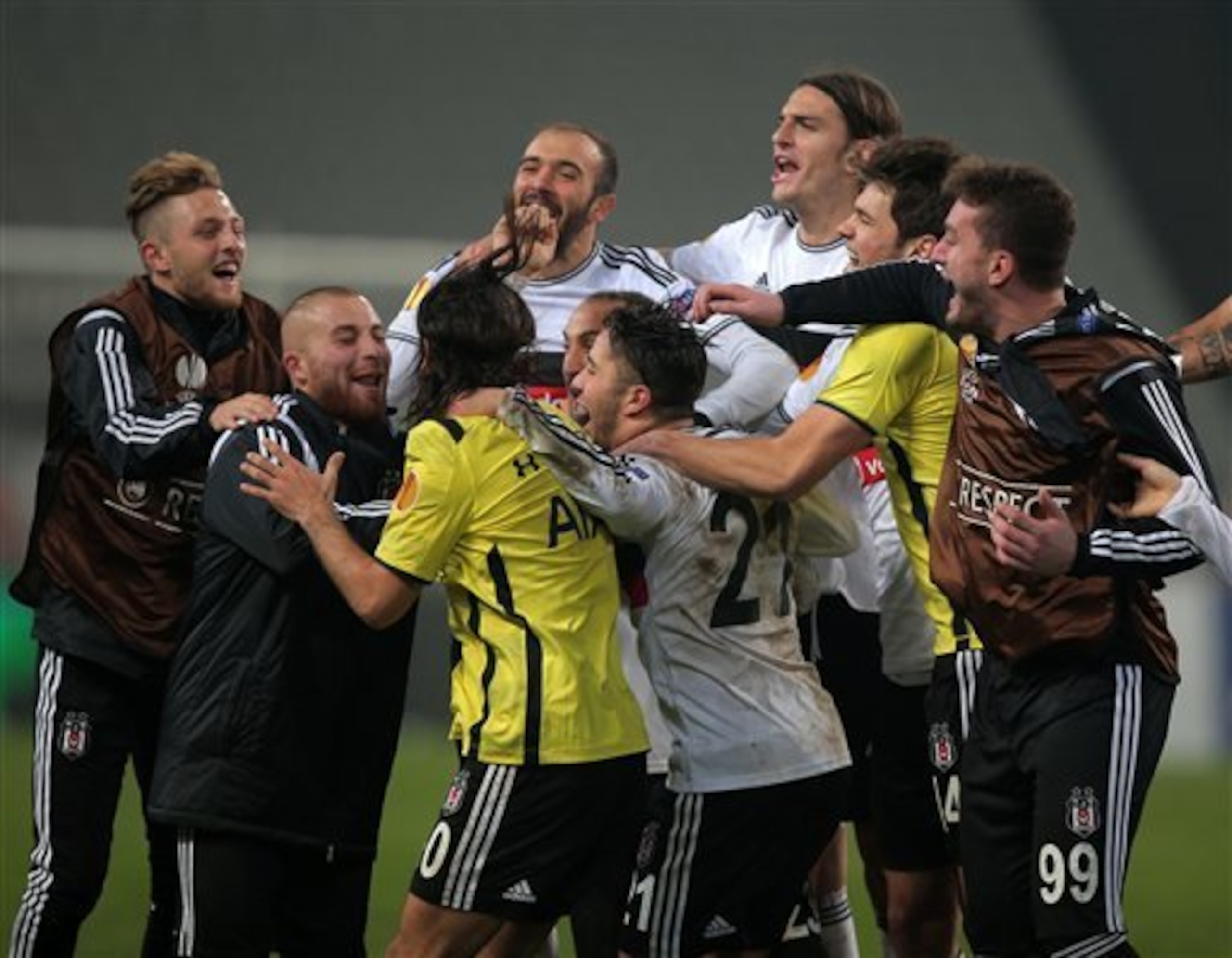 Besiktas players celebrate after their win.