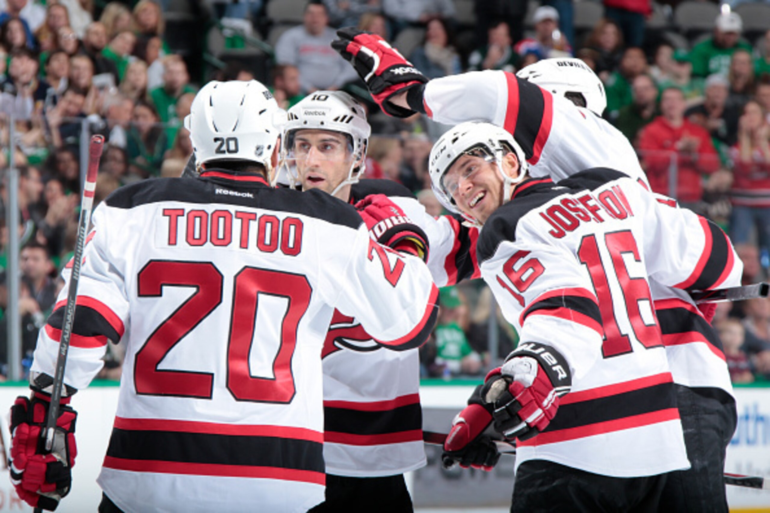 Peter Harrold, Jordan Tootoo and Jacob Josefson celebrate a goal during the Devils' 4-3 loss against the Dallas Stars.