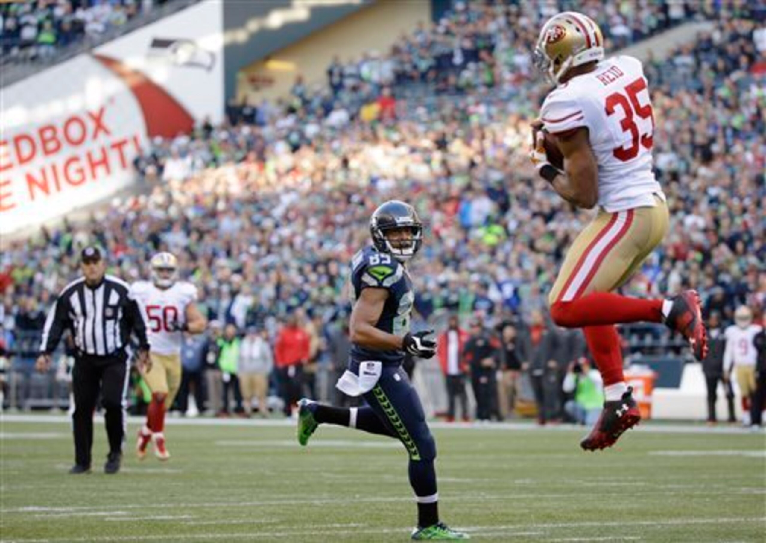 Safety Eric Reid picked off Russell Wilson for the 49ers' lone turnover in the game.