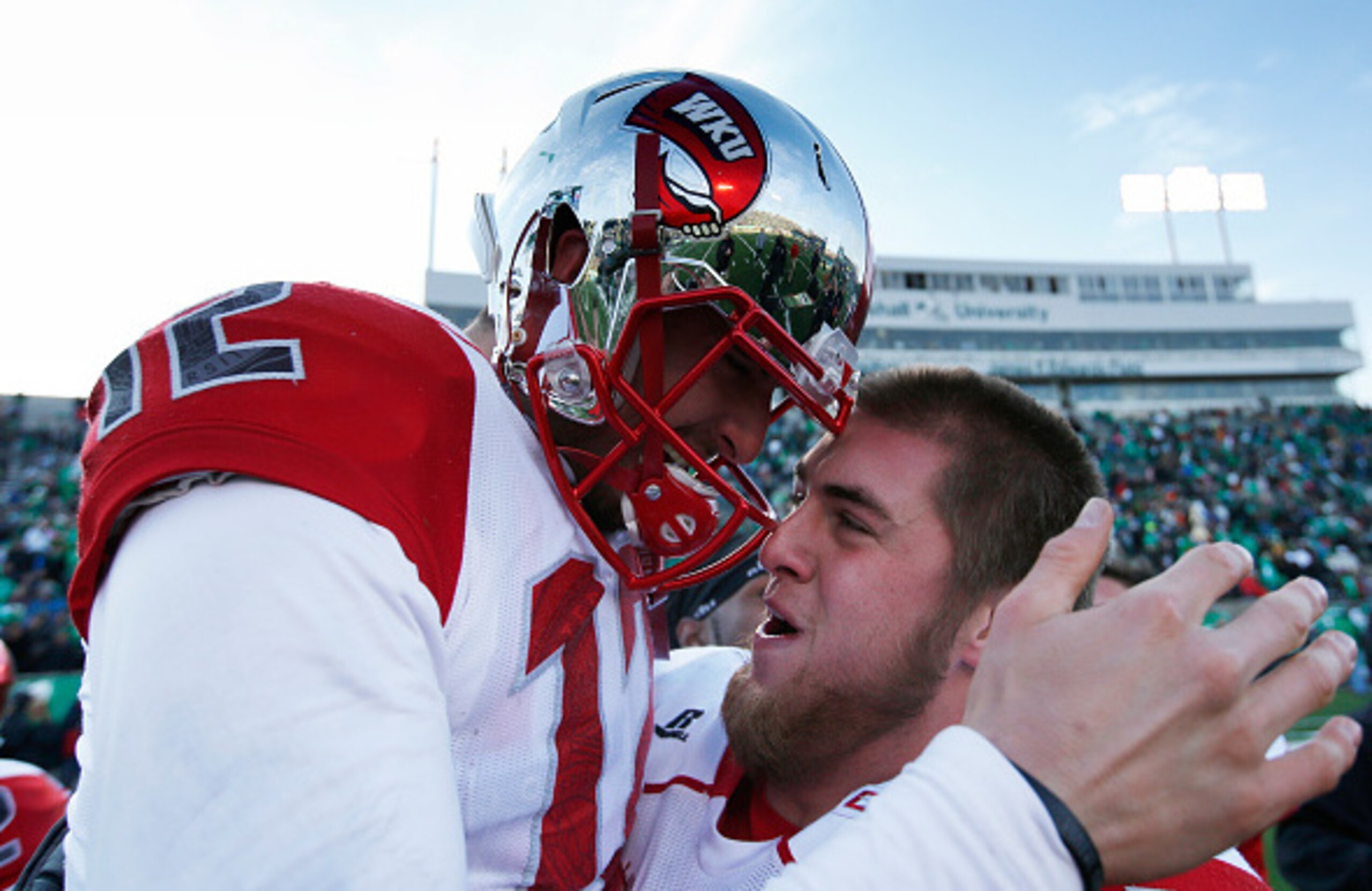 Western Kentucky QB Brandon Doughty (left)