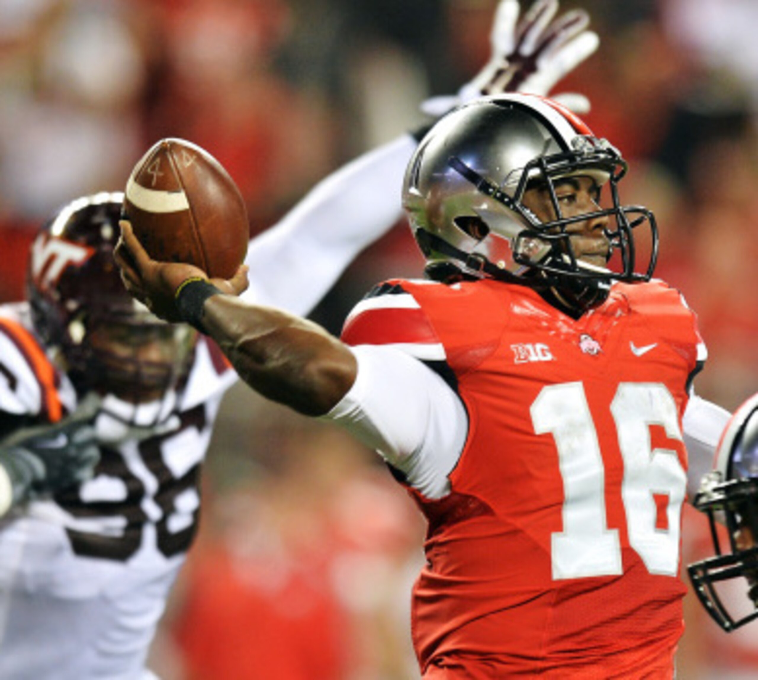COLUMBUS, OH - SEPTEMBER 6: Quarterback J.T. Barrett #16 of the Ohio State Buckeyes passes against the Virginia Tech Hokies in the second quarter at Ohio Stadium on September 6, 2014 in Columbus, Ohio. (Photo by Jamie Sabau/Getty Images) COLUMBUS, OH - SEPTEMBER 6: Quarterback J.T. Barrett #16 of the Ohio State Buckeyes passes against the Virginia Tech Hokies in the second quarter at Ohio Stadium on September 6, 2014 in Columbus, Ohio. (Photo by Jamie Sabau/Getty Images)