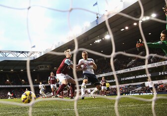 Harry Kane's header goes past Tom Heaton.