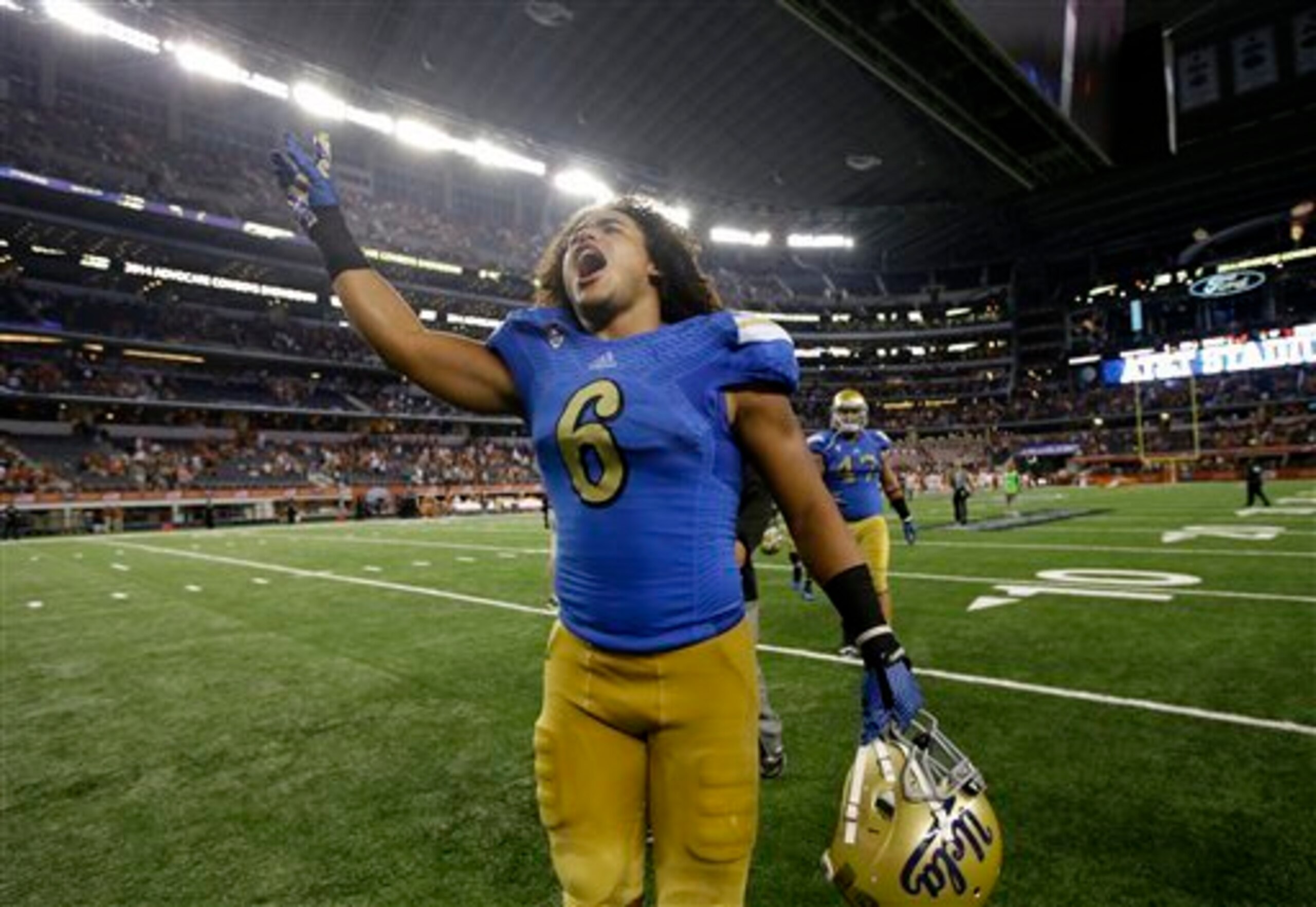 Kendricks celebrating the emotional win over Texas.