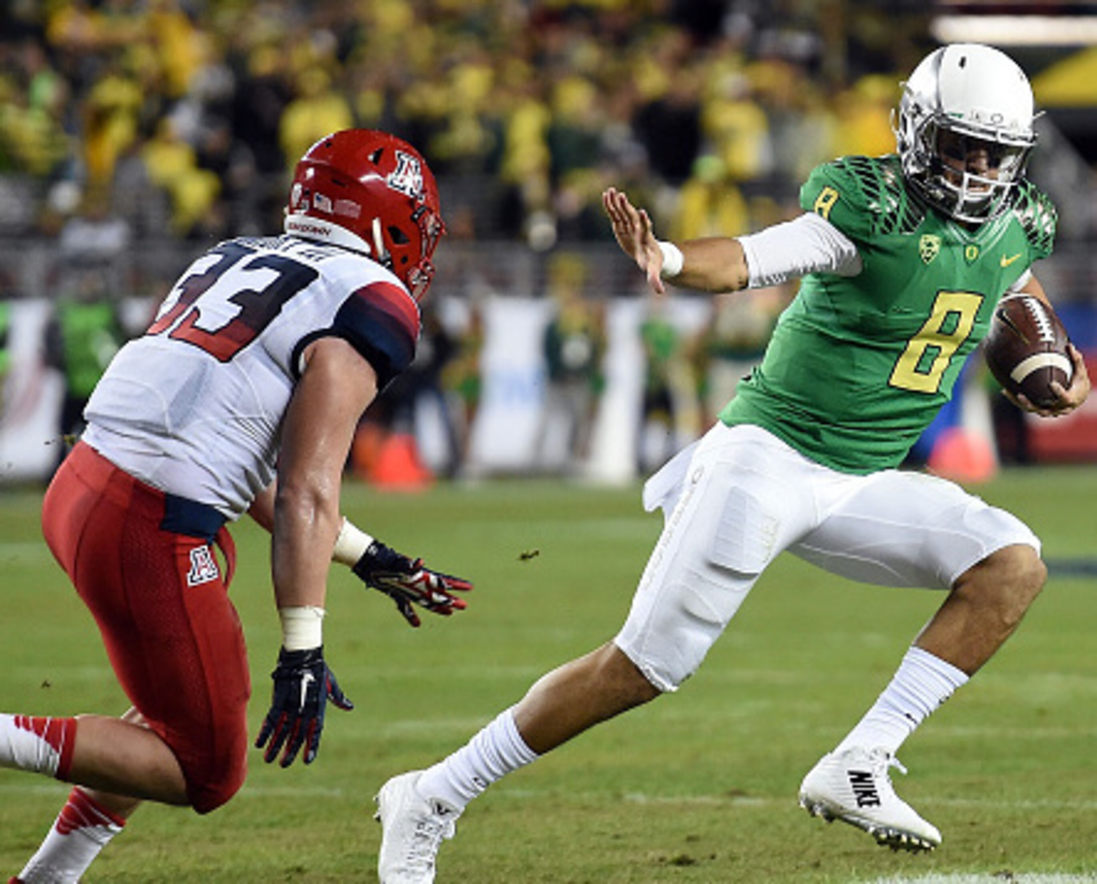 LB Scooby Wright couldn't best Mariota in their second meeting of 2014
