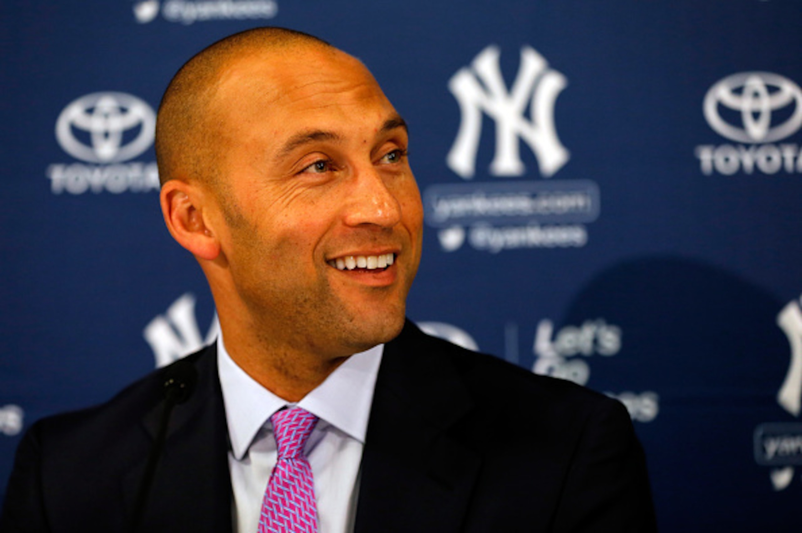 BOSTON, MA - SEPTEMBER 28:  Derek Jeter #2 of the New York Yankees speaks to the media following his last career game against the Boston Red Sox at Fenway Park on September 28, 2014 in Boston, Massachusetts.  (Photo by Jim Rogash/Getty Images)
