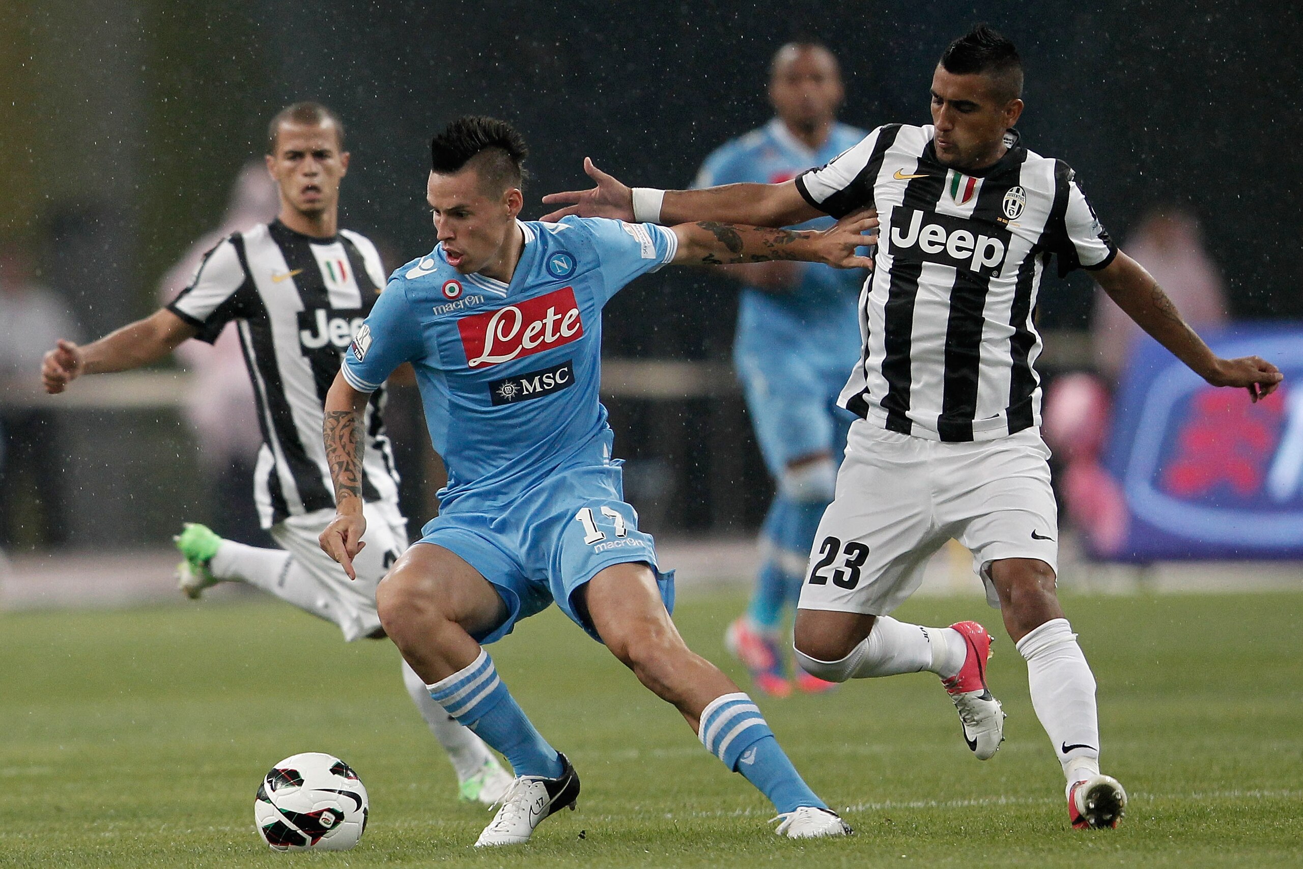 Marek Hamsik and Arturo Vidal battled in midfield during the 2012 Supercoppa.  They will duel again on Monday.