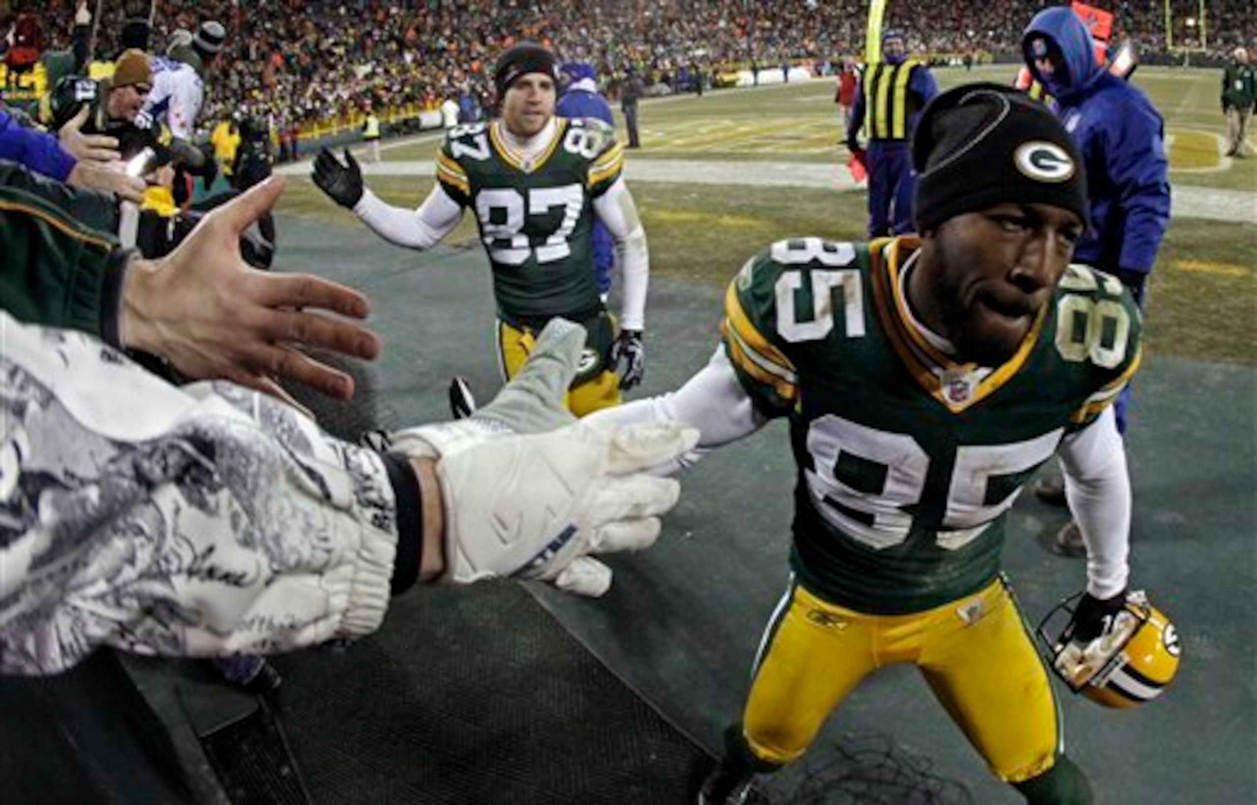 The Packers celebrated making the playoffs after beating the Bears.