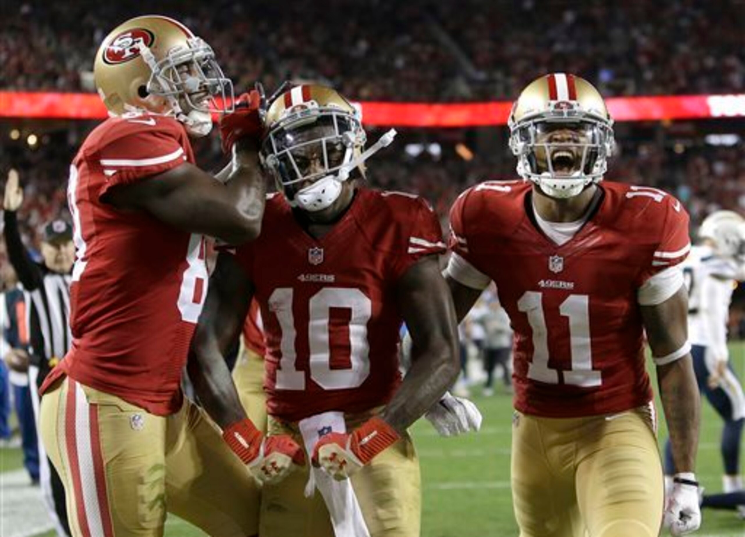 Wide receiver Bruce Ellington (center) recorded two touchdowns before being removed with an injury.