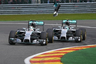 Nico Rosberg and Lewis Hamilton collide at the 2014 Belgian Grand Prix.