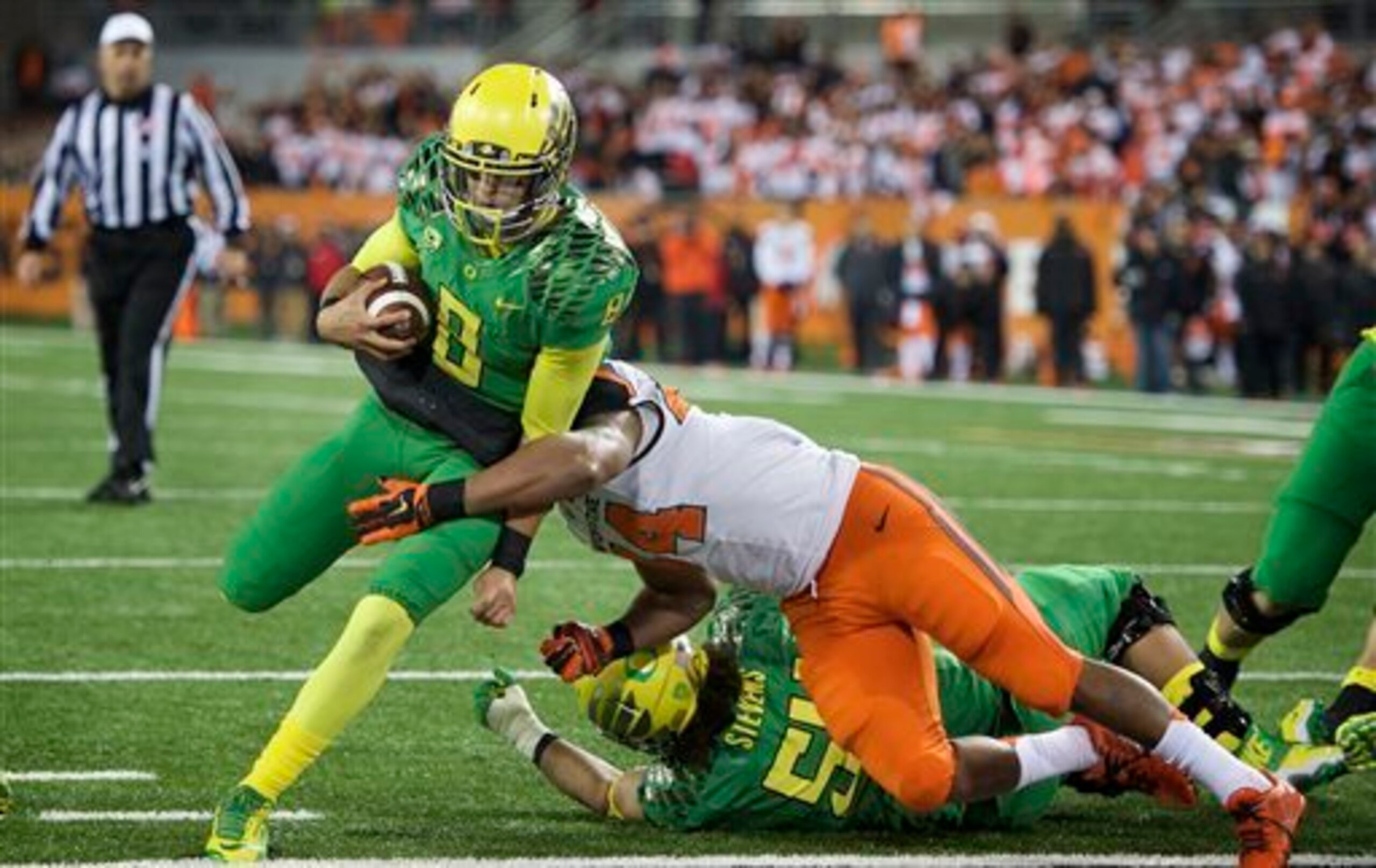 Oregon's Marcus Mariota is college football's top player.