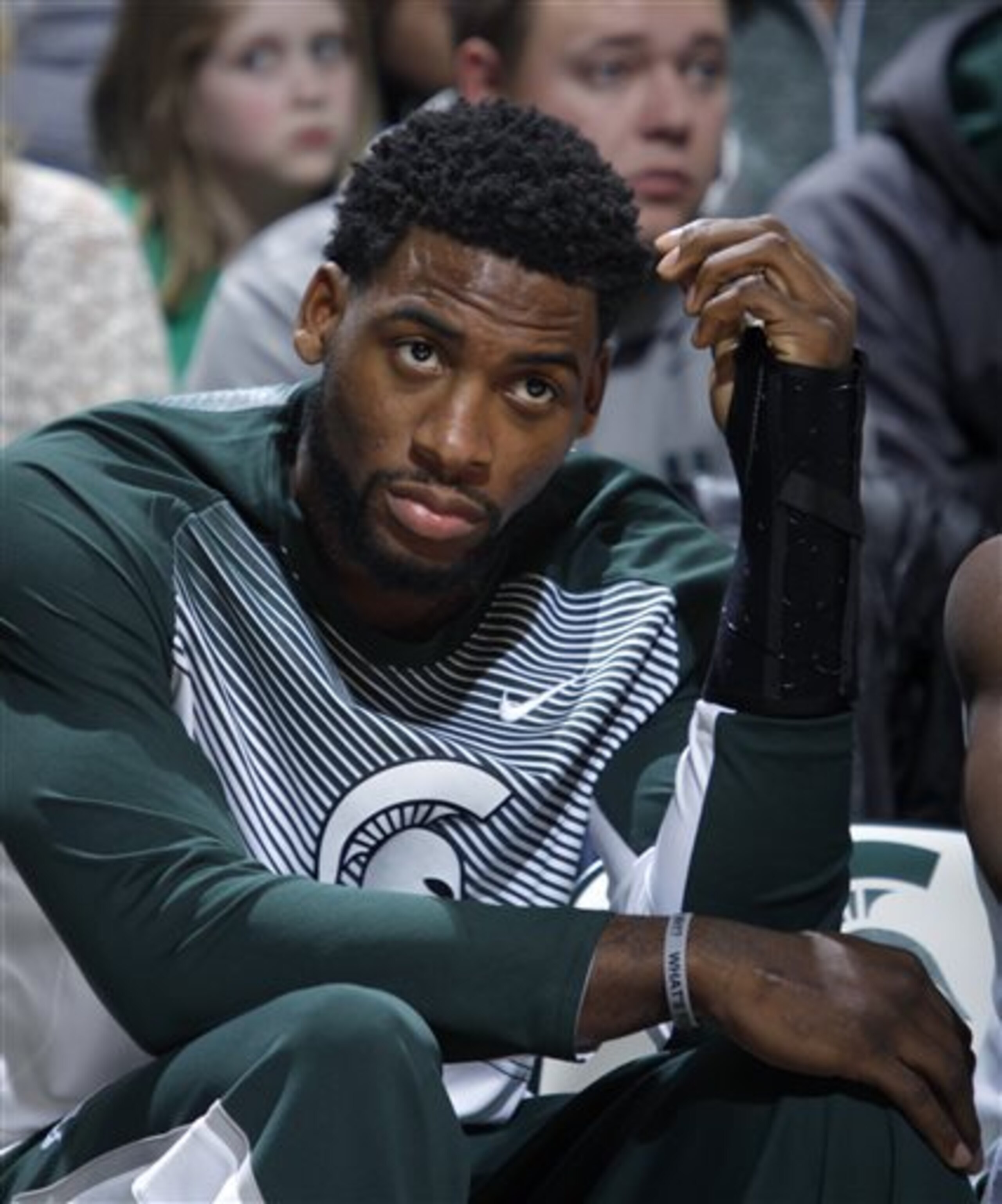 Michigan State's Branden Dawson nurses a wrist injury.