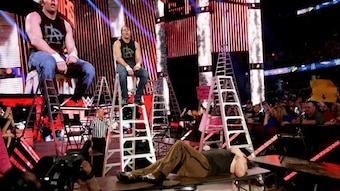 Dean Ambrose goes high risk in the TLC match.