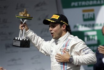 Felipe Massa celebrates a podium finish at his home race in Brazil.
