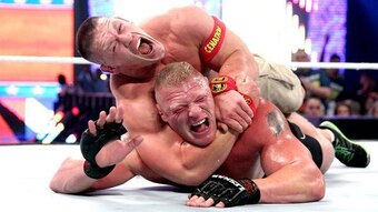 John Cena secures Brock Lesnar in the STF.