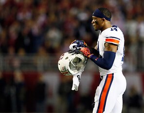Nick Marshall and Auburn will take on Wisconsin in the Outback Bowl.