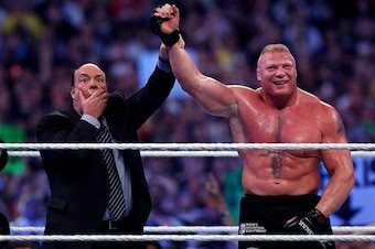 Paul Heyman and Brock Lesnar celebrate at WrestleMania..