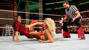 Fandango serves as the special guest referee in a match between Layla and Summer Rae.