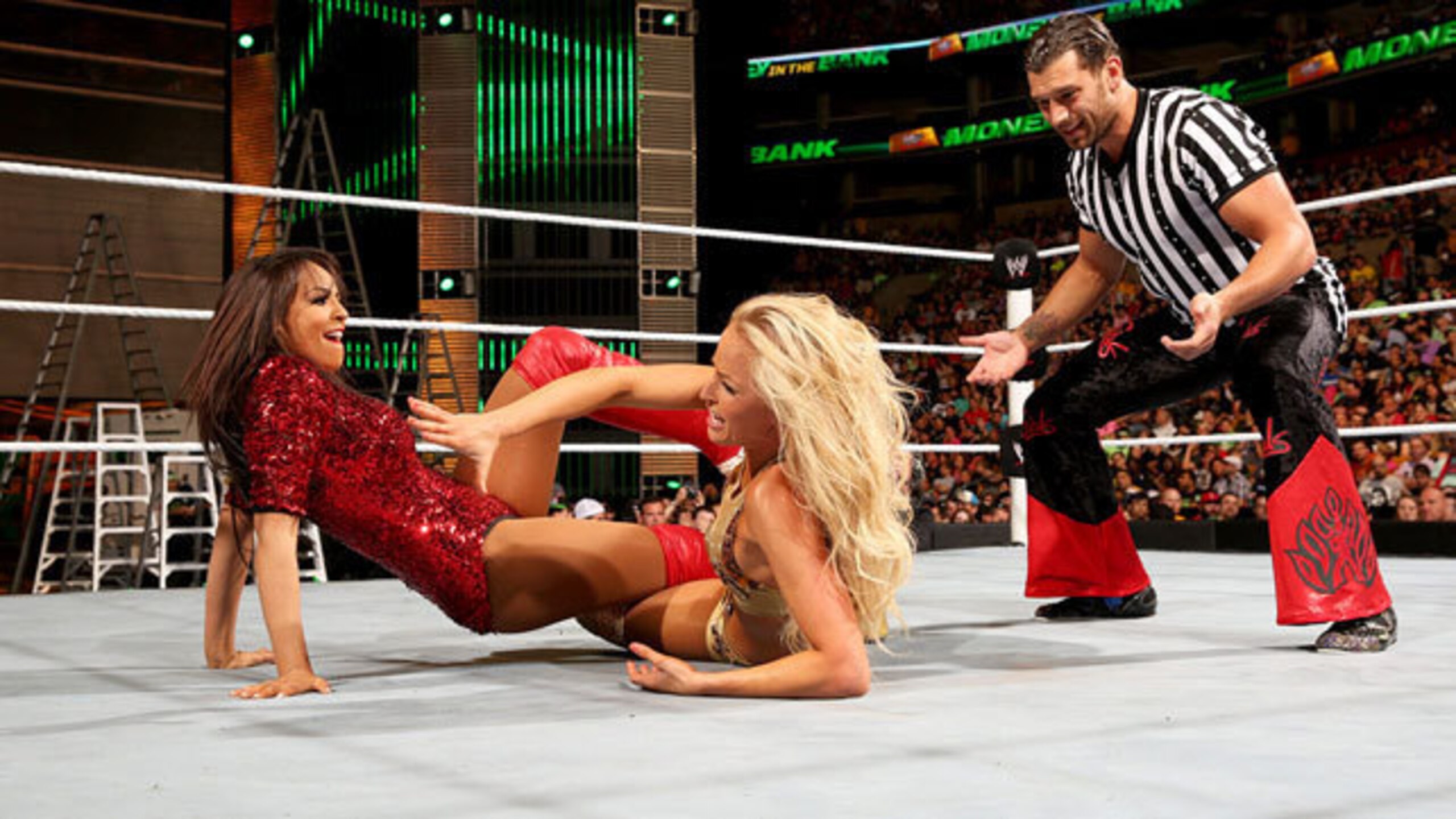 Fandango serves as the special guest referee in a match between Layla and Summer Rae.