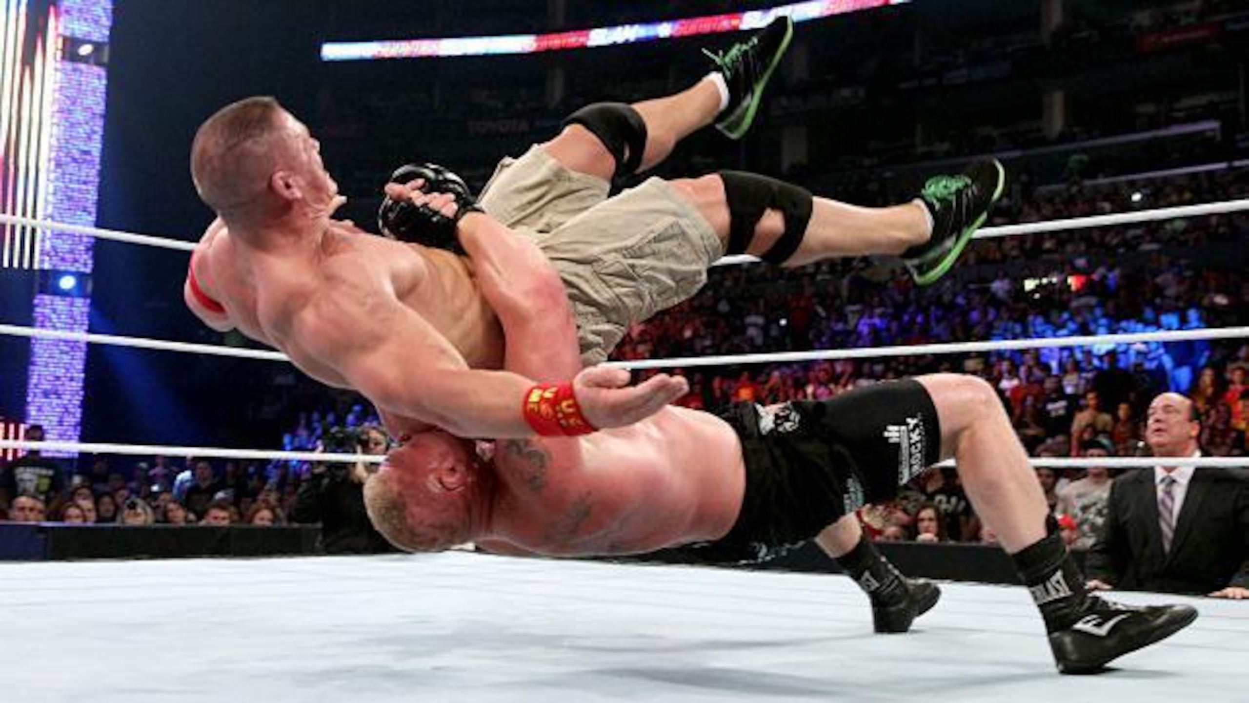 Brock Lesnar nails a devastating German Suplex on John Cena.