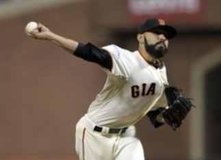 Oct 25, 2014; San Francisco, CA, USA; San Francisco Giants relief pitcher Sergio Romo throws a pitch against the Kansas City Royals in the 8th inning during game four of the 2014 World Series at AT&T Park. Mandatory Credit: Christopher Hanewinckel-USA TOD Oct 25, 2014; San Francisco, CA, USA; San Francisco Giants relief pitcher Sergio Romo throws a pitch against the Kansas City Royals in the 8th inning during game four of the 2014 World Series at AT&T Park. Mandatory Credit: Christopher Hanewinckel-USA TOD