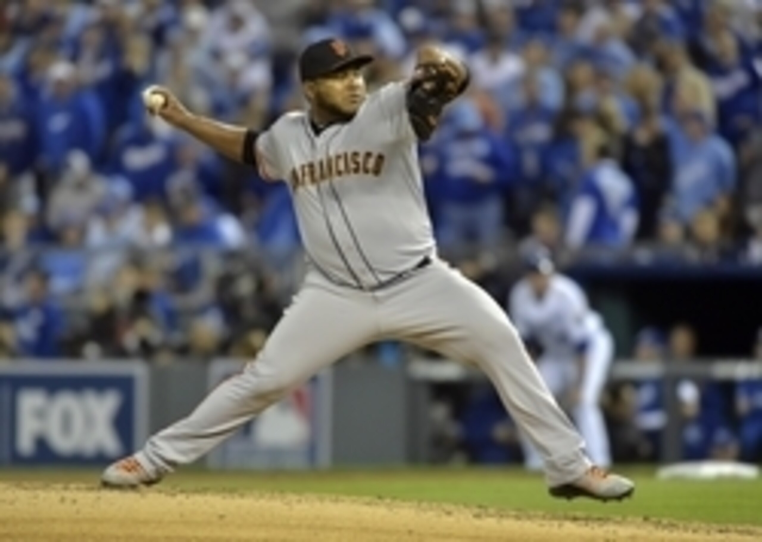 Oct 28, 2014; Kansas City, MO, USA; San Francisco Giants relief pitcher Jean Machi throws a pitch against the Kansas City Royals in the third inning during game six of the 2014 World Series at Kauffman Stadium. Mandatory Credit: Denny Medley-USA TODAY Spo