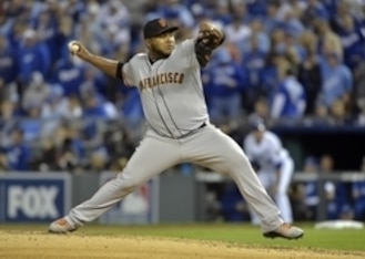 Oct 28, 2014; Kansas City, MO, USA; San Francisco Giants relief pitcher Jean Machi throws a pitch against the Kansas City Royals in the third inning during game six of the 2014 World Series at Kauffman Stadium. Mandatory Credit: Denny Medley-USA TODAY Spo Oct 28, 2014; Kansas City, MO, USA; San Francisco Giants relief pitcher Jean Machi throws a pitch against the Kansas City Royals in the third inning during game six of the 2014 World Series at Kauffman Stadium. Mandatory Credit: Denny Medley-USA TODAY Spo