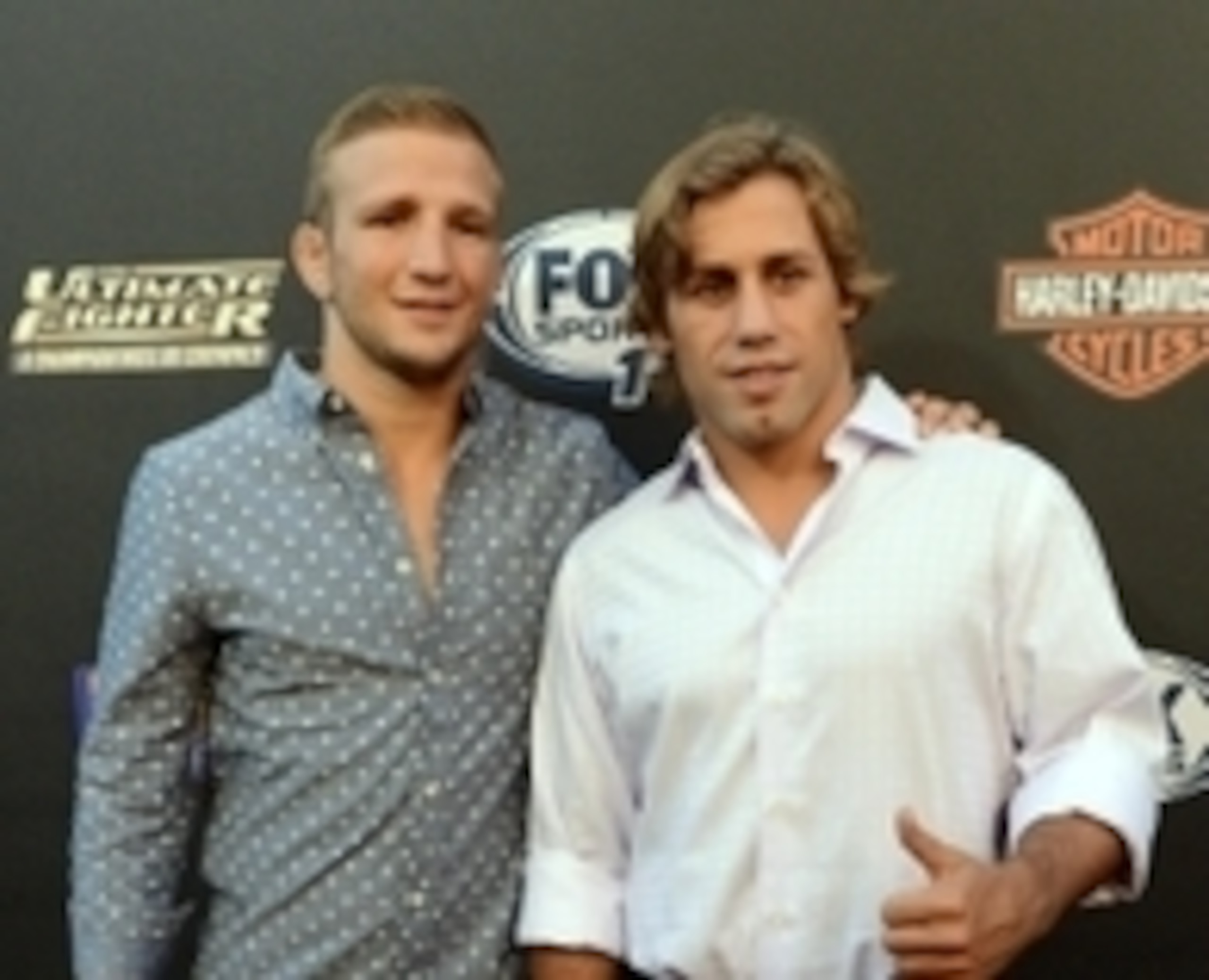T.J. Dillashaw (L) and Urijah Faber (R) T.J. Dillashaw (L) and Urijah Faber (R)