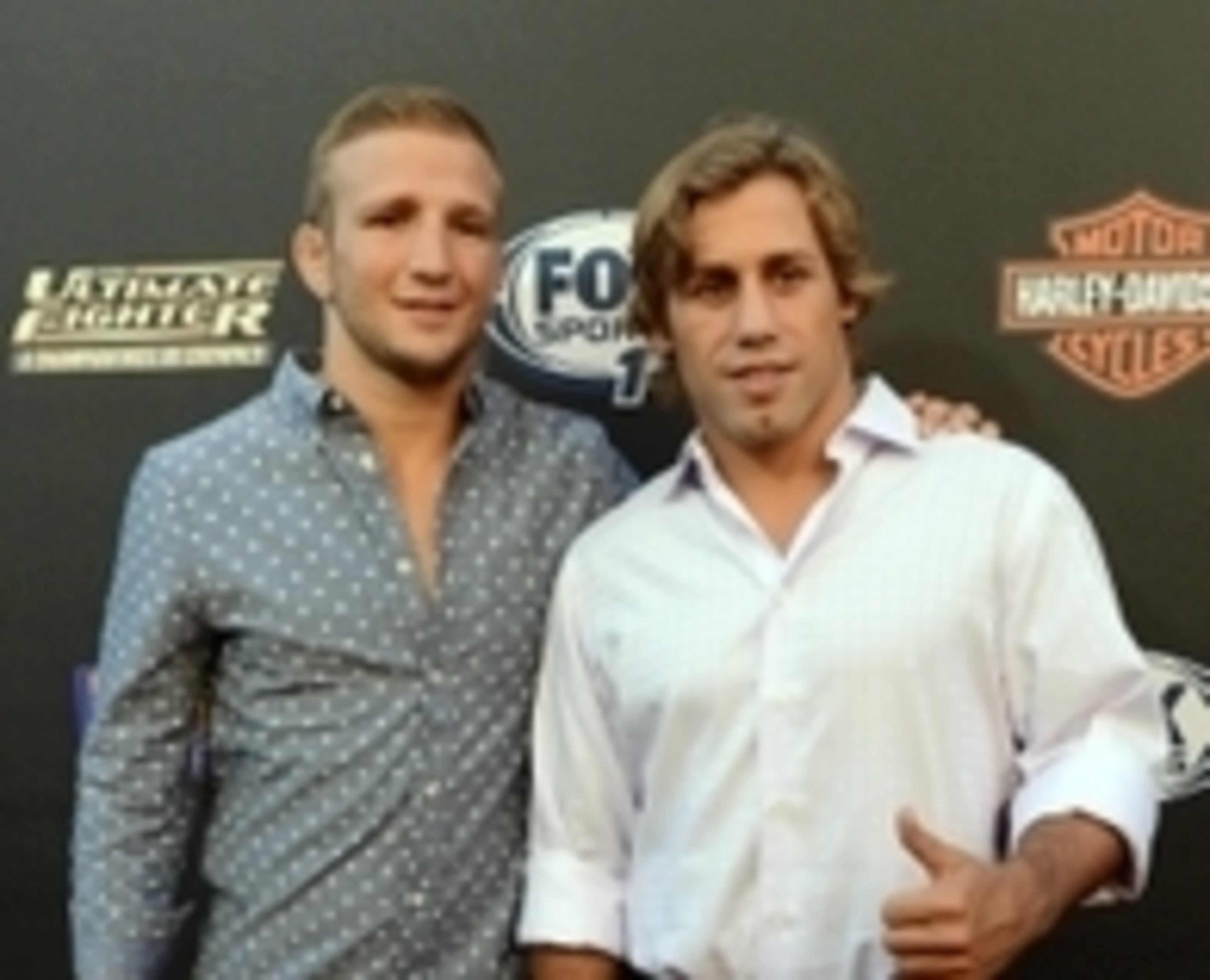 T.J. Dillashaw (L) and Urijah Faber (R)