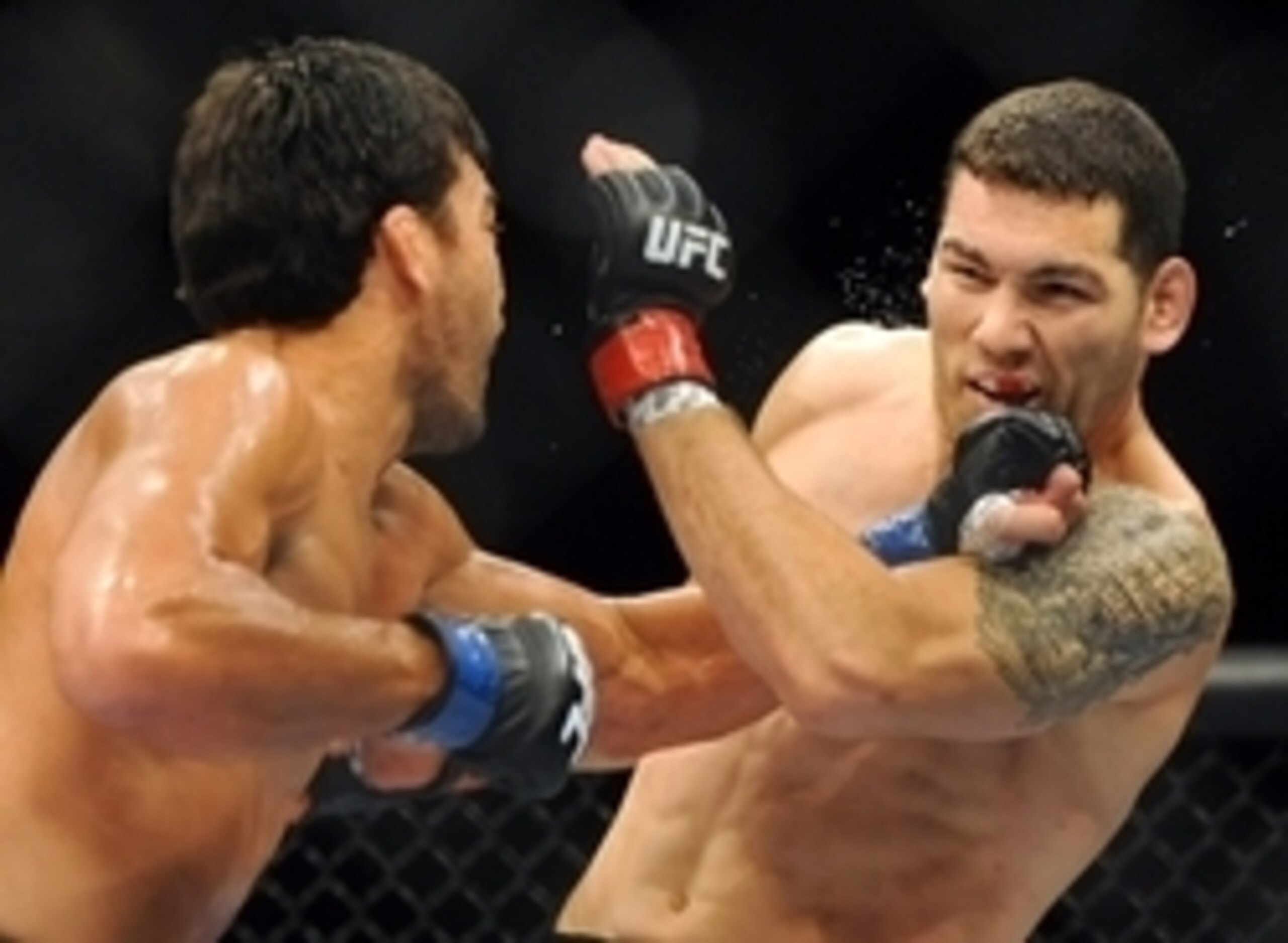 Chris Weidman (R) and Lyoto Machida (L) Chris Weidman (R) and Lyoto Machida (L)